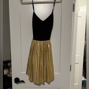 Amanda Upichard black and gold dress